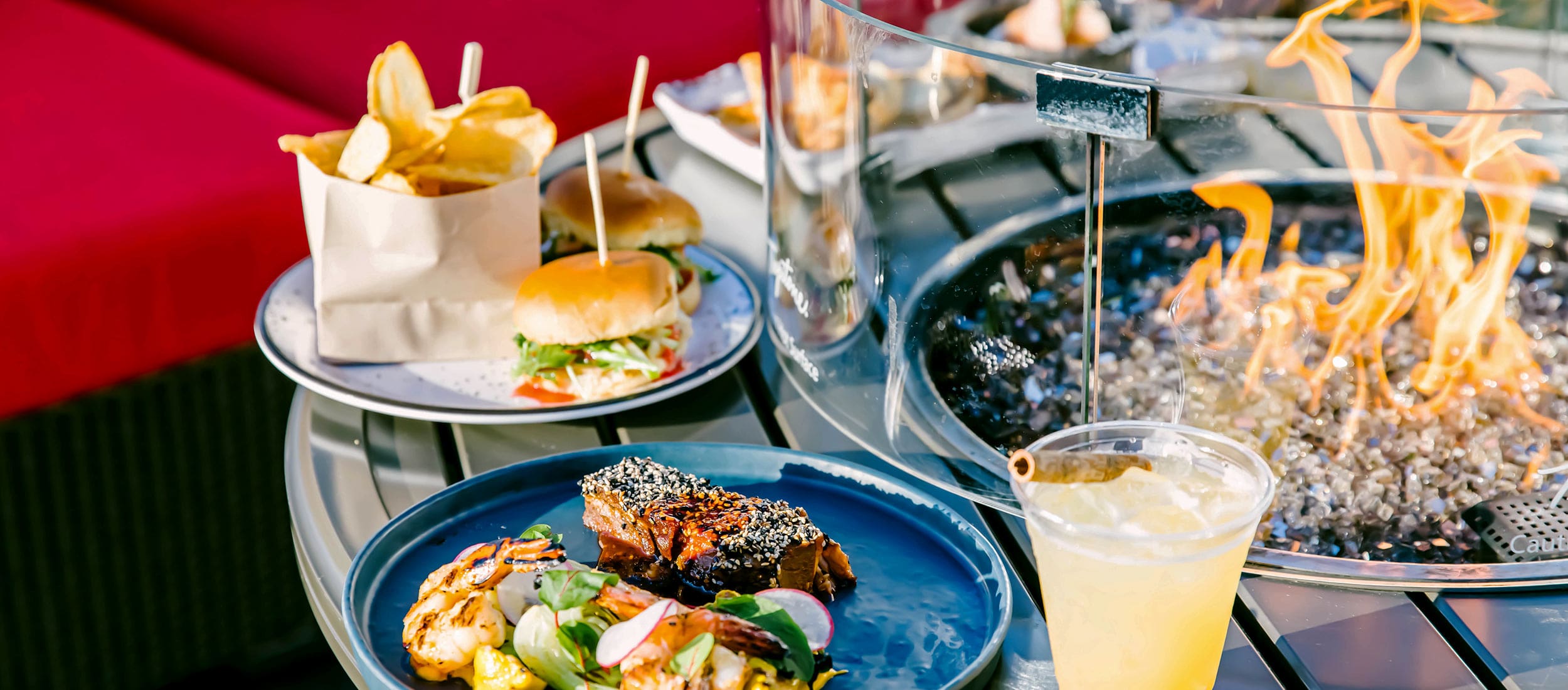 Food and fire pit at Frostbite Lounge