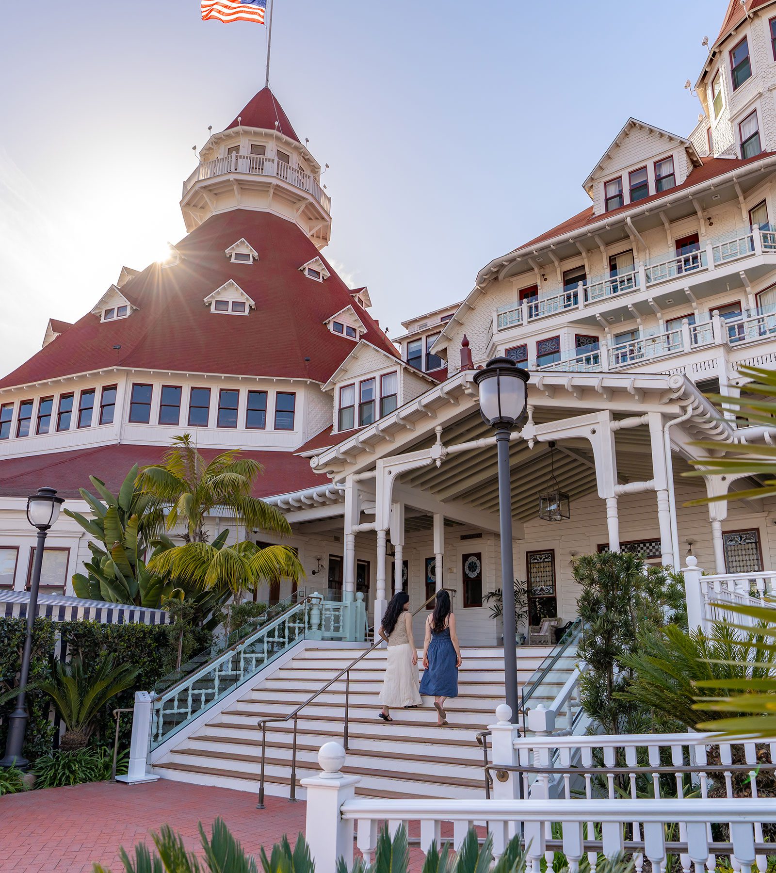 Hotel front entrance with ladies walking upstairs